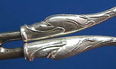   look like fish or dolphins. Inscribed W for Whiting, Sterling, 2808