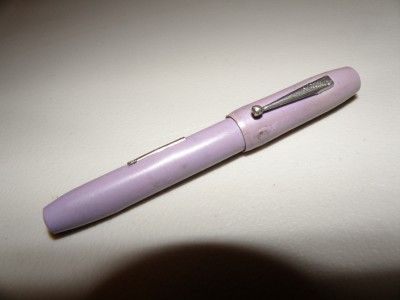 Unusual small purple Treasure brand fountain pen  