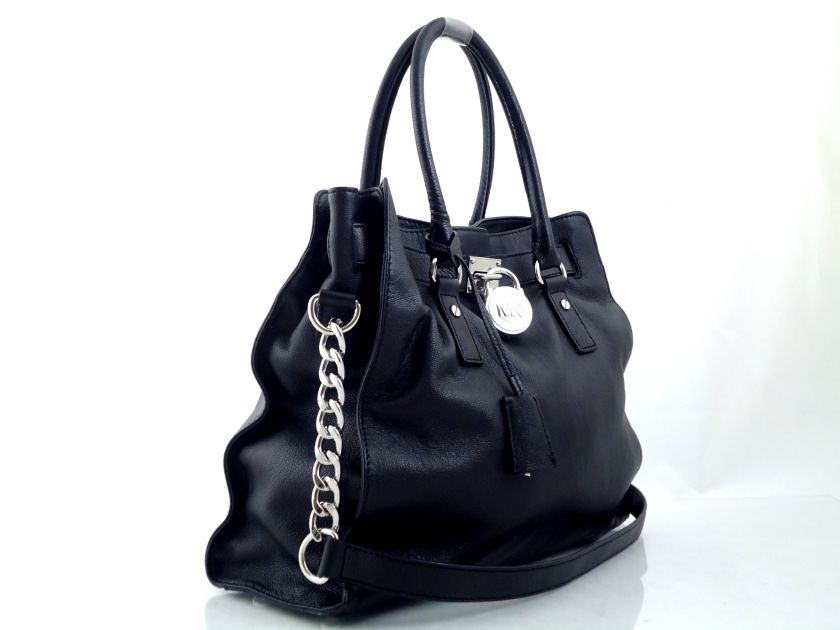   material leather size 4 x 14 5 x 13 5 dominant color black msrp $ 348