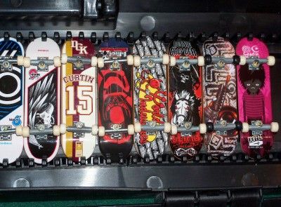 14 Tech Decks & Case  